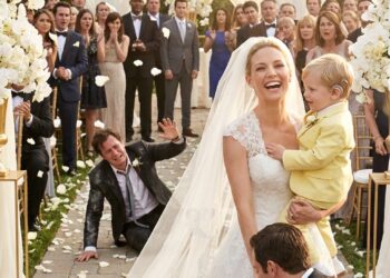 As I turned to walk away in my wedding dress, holding my son’s hand, the billionaire owner of the venue blocked our path.