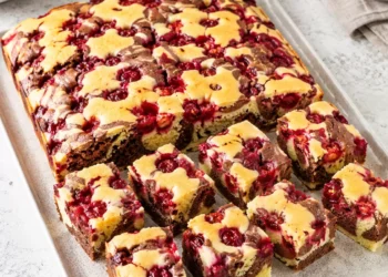 Marbled cake with cherries on a tray