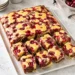 Marbled cake with cherries on a tray