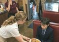 A soaked little boy walked into my struggling Chicago diner during a violent storm, shivering so badly he could barely hold the small paper bag in his hands.