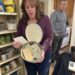 I was clearing out Mama’s pantry after her funeral when I discovered $18,940 tucked inside the old flour tin she had forbidden us to touch for decades. Beneath the bundles of cash was an envelope with my name on it.