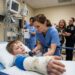 The rotting smell in Trauma Room 2 was unbearable, but when I finally cut off the 8-year-old boy’s filthy, neglected cast, what fell out onto the sterile floor made every seasoned ER nurse scream and step back in pure horror.