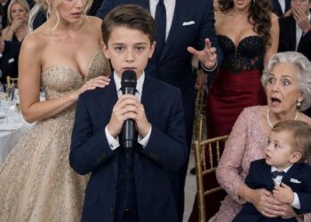 My husband brought his mistress and their secret child to my mother-in-law’s birthday party. In front of the entire family, he looked at me and said, “You don’t belong here anymore.” I was about to respond when my 10-year-old son stopped me, grabbed the microphone, and pulled out a USB drive. Seconds later, my husband realized the trap he had set for me could destroy him instead.