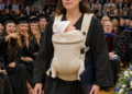 They laughed the instant I stepped onto the graduation stage with a newborn cradled in my arms. Someone seated behind me even muttered, “Just like its mother…” But the principal’s next words brought the entire auditorium to silence.