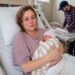 I lost one of my twins during labor. When the nurse gently placed my surviving baby boy in my arms, she leaned close and whispered, “Before you trust your husband, watch the video I just sent you.”